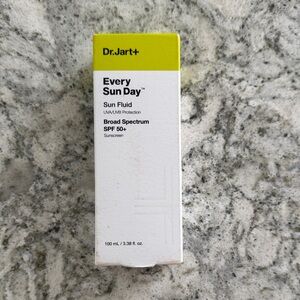 Every Sun Day Sun Fluid SPF 50+ - Yellow and White